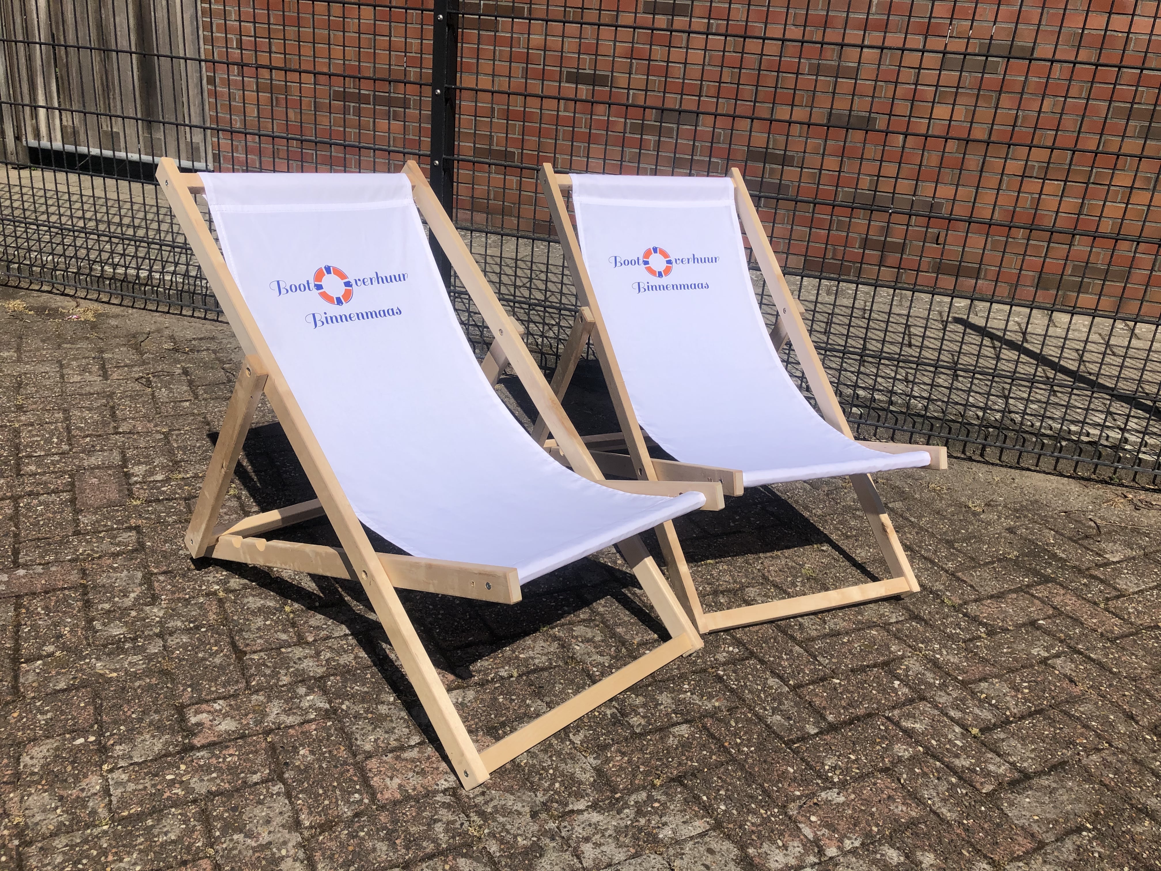 Foto 3 voordelen van bedrukte strandstoelen